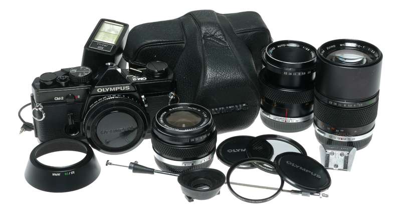 Olympus OM-2 SLR film camera 50mm 28mm 135mm auto lenses filters flash accessories