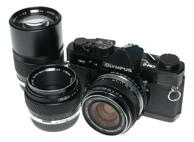 Olympus OM-2 SLR film camera 50mm 28mm 135mm auto lenses filters flash accessories