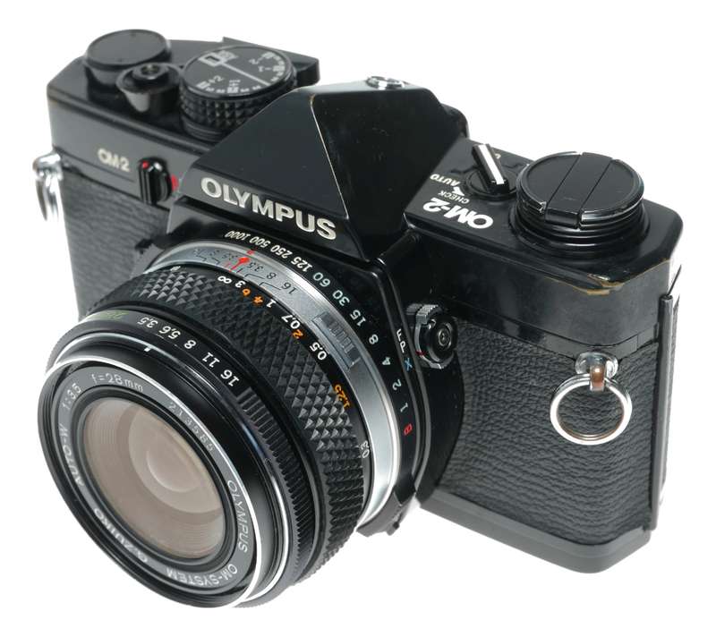 Olympus OM-2 SLR film camera 50mm 28mm 135mm auto lenses filters flash accessories