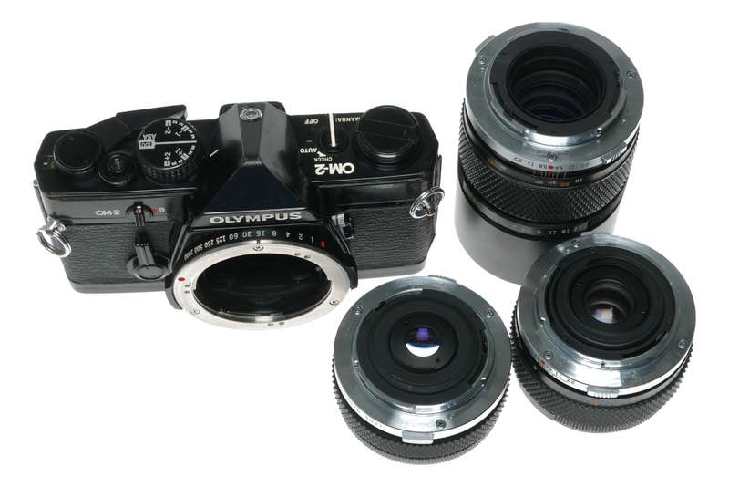 Olympus OM-2 SLR film camera 50mm 28mm 135mm auto lenses filters flash accessories