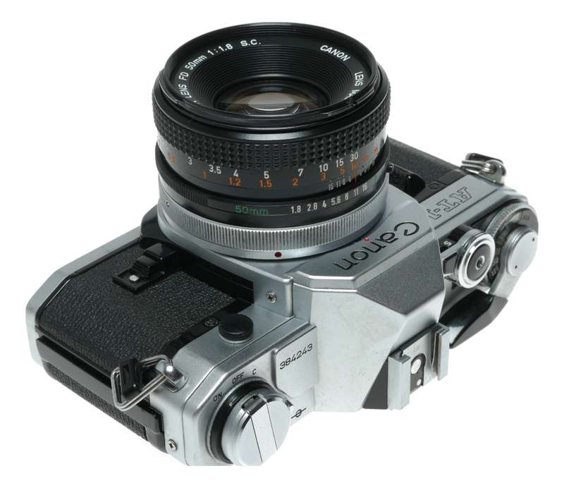 Canon AT-1 35mm film SLR camera FD 1:1.8 50mm lens filter cap shade hood