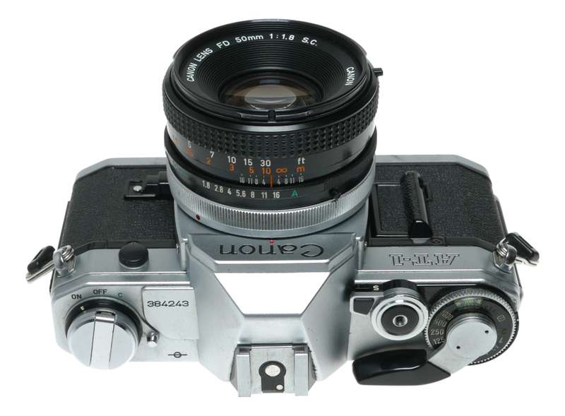 Canon AT-1 35mm film SLR camera FD 1:1.8 50mm lens filter cap shade hood