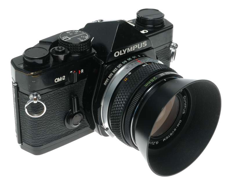 Olympus OM-2 SLR film camera 50mm 28mm 135mm auto lenses filters flash accessories