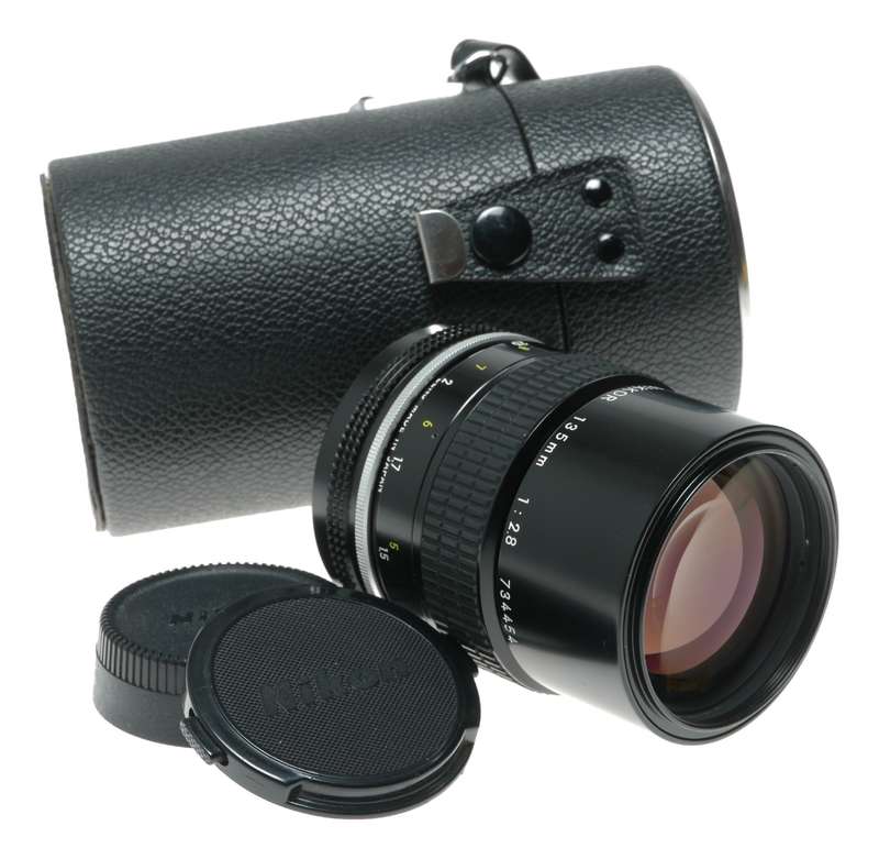 Nikon Ai Nikkor 1:2.8 135mm telephoto MF camera lens caps keeper
