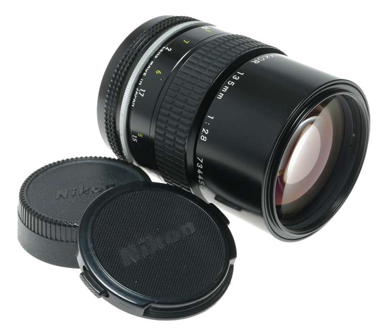Nikon Ai Nikkor 1:2.8 135mm telephoto MF camera lens caps keeper