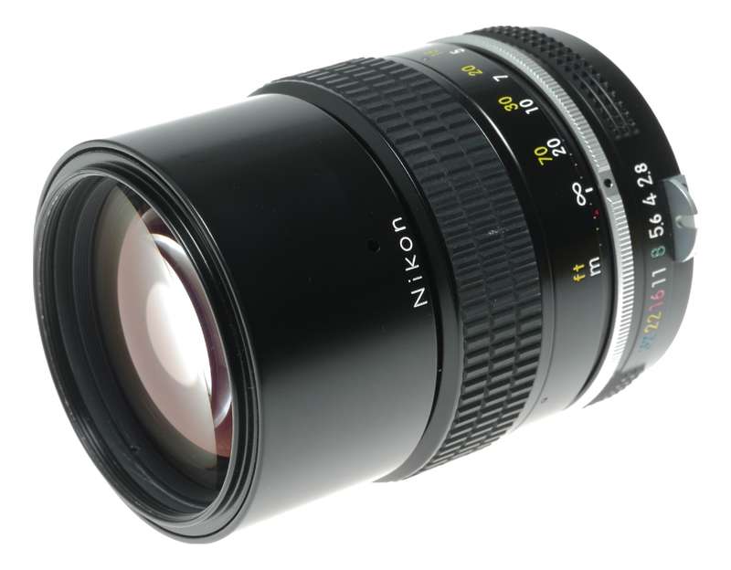 Nikon Ai Nikkor 1:2.8 135mm telephoto MF camera lens caps keeper