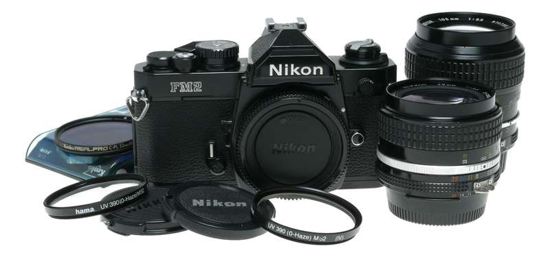 Nikon FM2 Black SLR Camera 1:3.5/28 Nikkor 1:2.5/105 Lenses Caps Filters