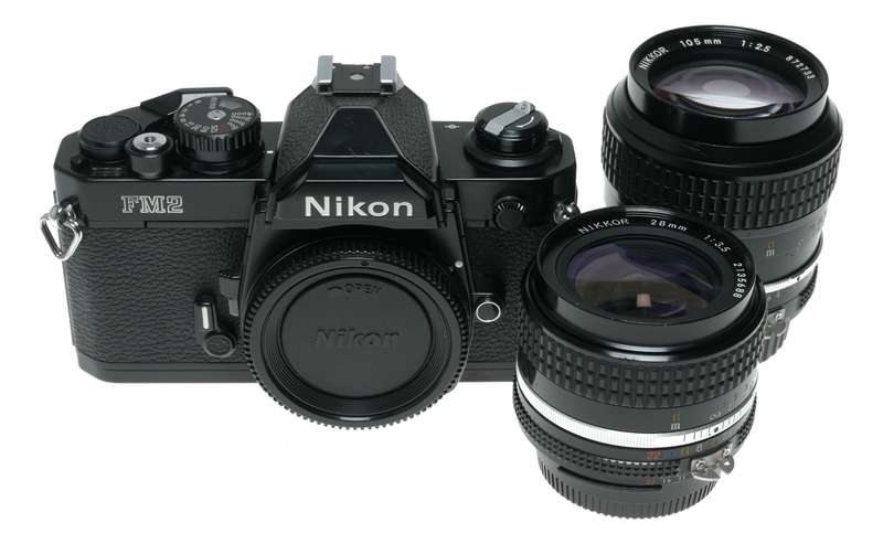 Nikon FM2 Black SLR Camera 1:3.5/28 Nikkor 1:2.5/105 Lenses Caps Filters