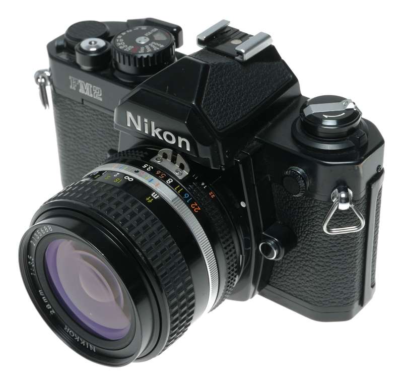 Nikon FM2 Black SLR Camera 1:3.5/28 Nikkor 1:2.5/105 Lenses Caps Filters