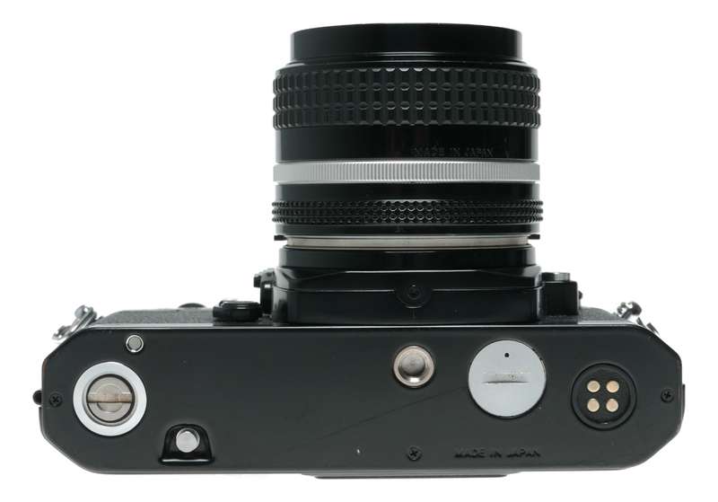 Nikon FM2 Black SLR Camera 1:3.5/28 Nikkor 1:2.5/105 Lenses Caps Filters