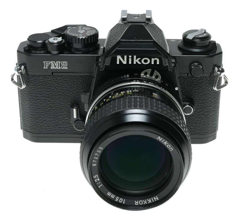 Nikon FM2 Black SLR Camera 1:3.5/28 Nikkor 1:2.5/105 Lenses Caps Filters