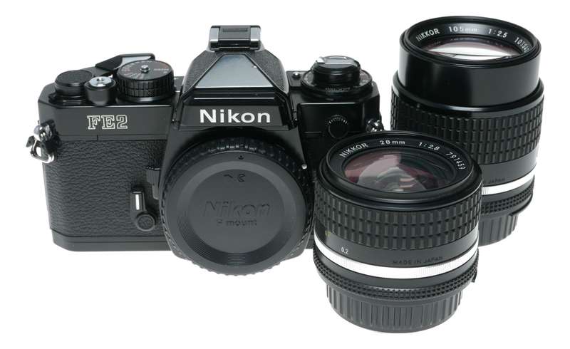 Nikon FM2 SLR Black Film Camera 1:2.8/28 Nikkor 1:2.5/105 Lenses Caps
