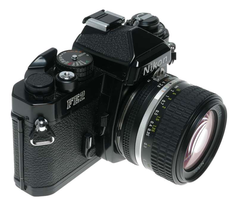 Nikon FM2 SLR Black Film Camera 1:2.8/28 Nikkor 1:2.5/105 Lenses Caps