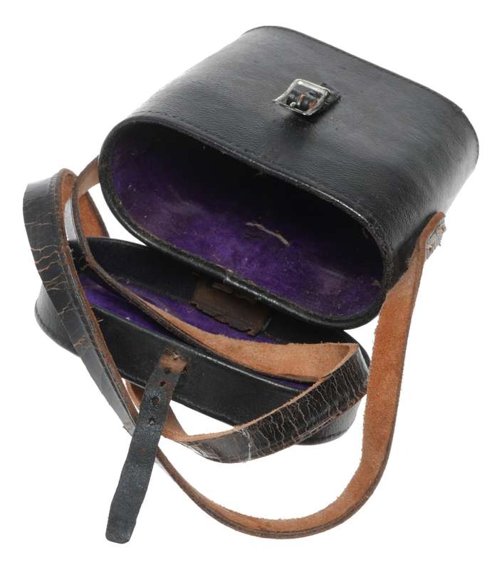 Binocular red velvet vintage leather case in used condition with strap