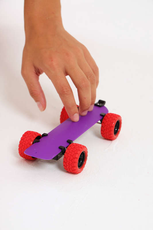 Senza® Slap On Pullback Skateboard Bracelet With Wheels