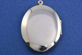 Gilt Locket  |  |