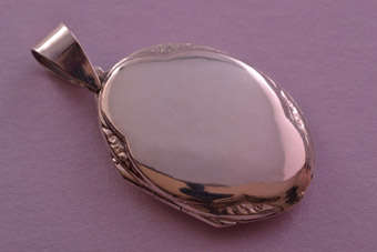 Silver Modern Locket |  |