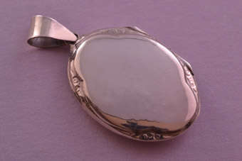 Silver Modern Locket |  |