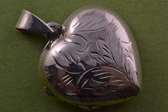Silver Heart Locket |  |