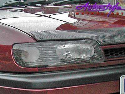 Triton 07 + model Carbon Look Headlight Guard