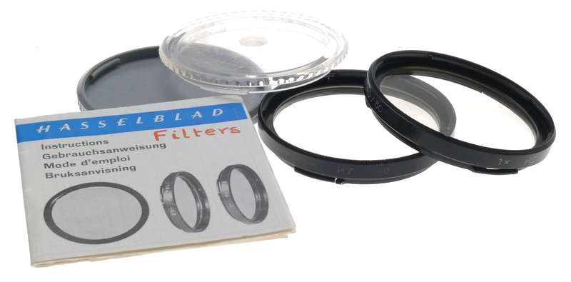 HASSELBLAD /50 CAMERA LENS FILTER 1x HZ -0 PAIR WITH CAPS FOR SALE WITH MANUAL