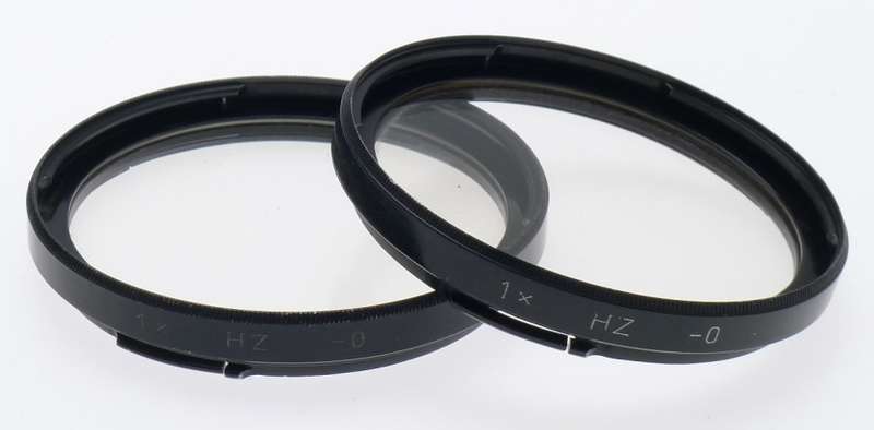 HASSELBLAD /50 CAMERA LENS FILTER 1x HZ -0 PAIR WITH CAPS FOR SALE WITH MANUAL