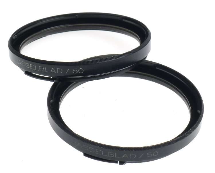 HASSELBLAD /50 CAMERA LENS FILTER 1x HZ -0 PAIR WITH CAPS FOR SALE WITH MANUAL