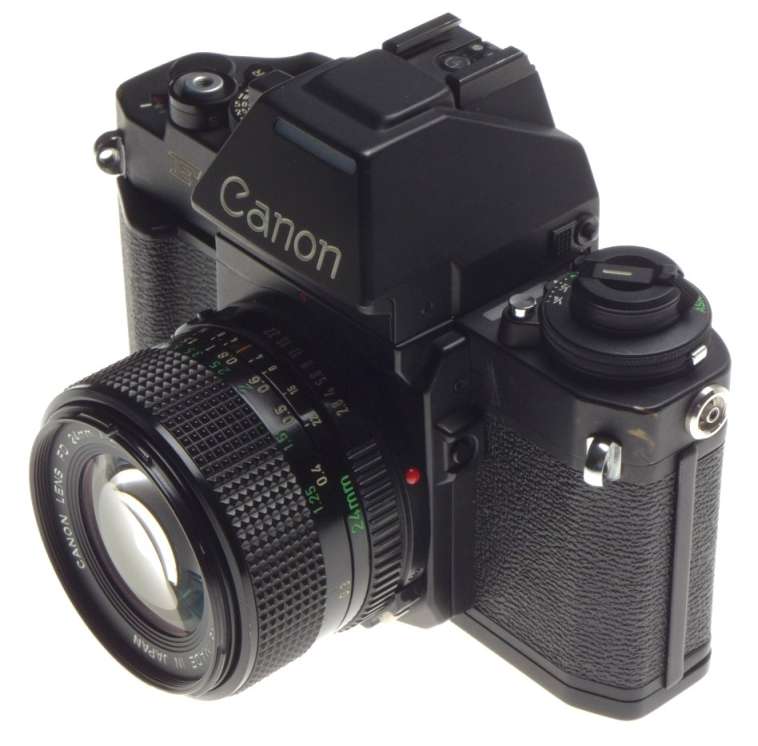 CANON F-1 SLR 35mm film F1 camera Black FD 24mm 1:2.8 filter cap good condition