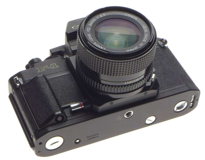 CANON F-1 SLR 35mm film F1 camera Black FD 24mm 1:2.8 filter cap good condition