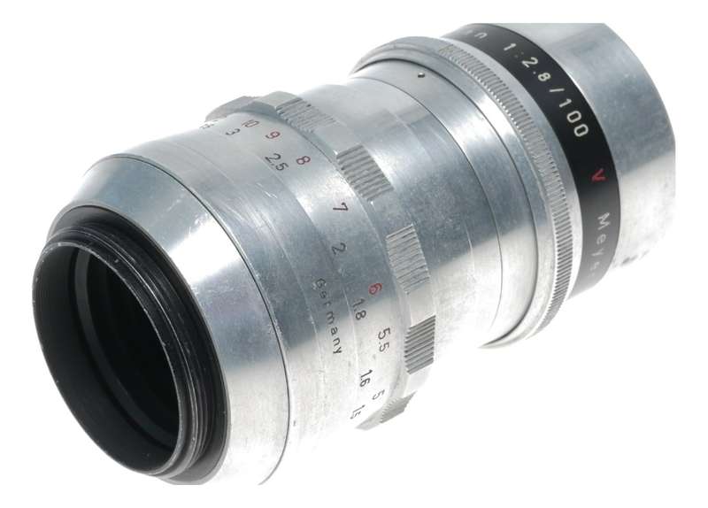 Trioplan 1:2.8/100 red V f=100mm prime f/3.5 chrome hood clean M42