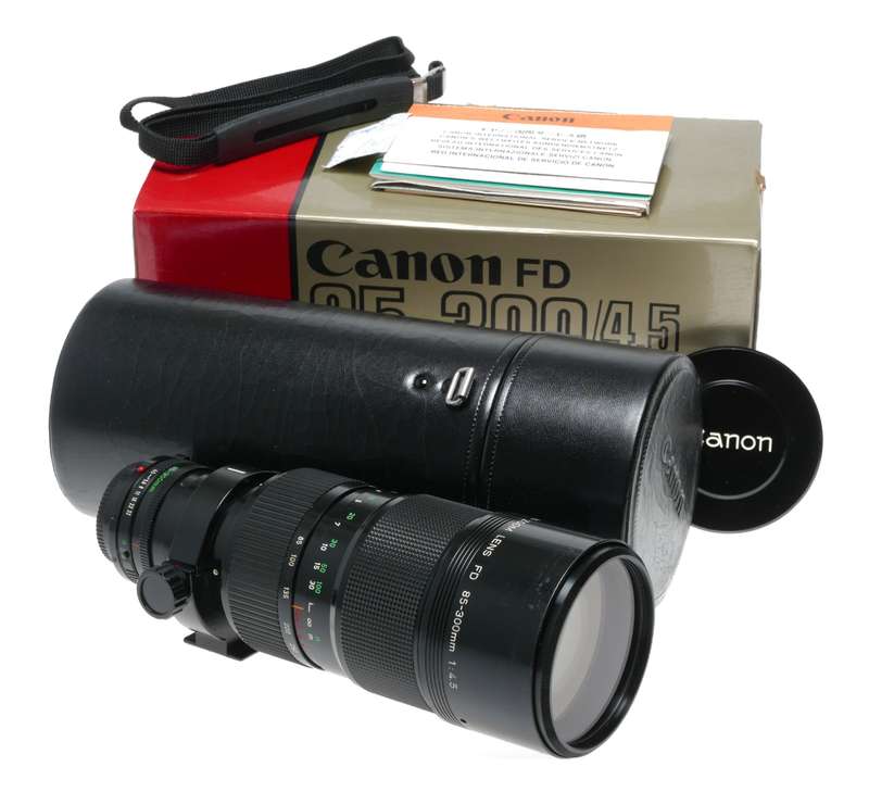 Canon FD 85-300/4.5 Zoom lens fits SLR 35mm film camera set box hood caps