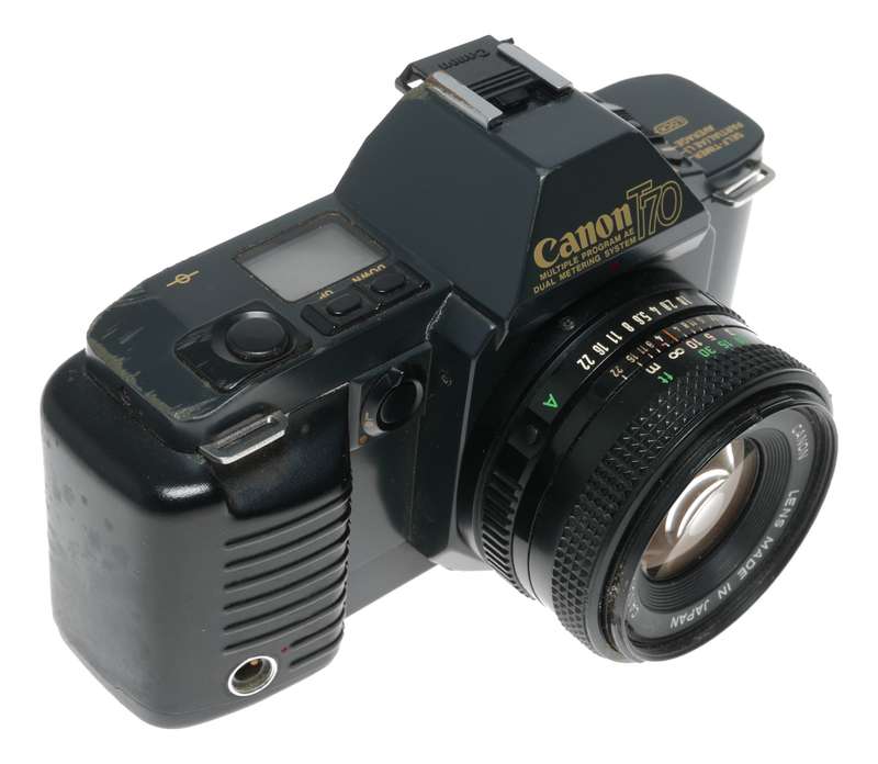 Canon T70 SLR retro film camera FD 50mm 1.8 lens strap and body cap