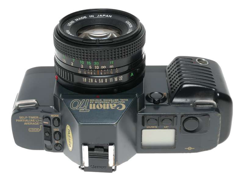 Canon T70 SLR retro film camera FD 50mm 1.8 lens strap and body cap