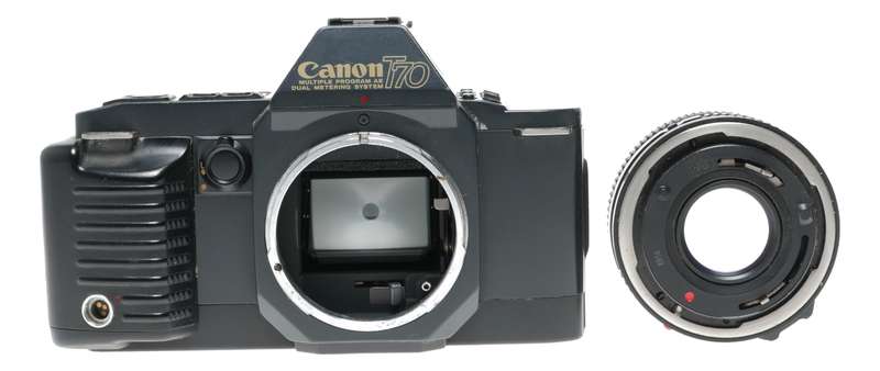Canon T70 SLR retro film camera FD 50mm 1.8 lens strap and body cap