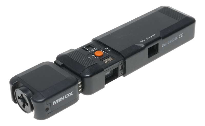 Minox EC black spy camera with flash accessory box and manual