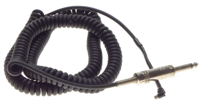 SYNC jack connecting flash camera cable coiled with headphone jack Sinar Leica
