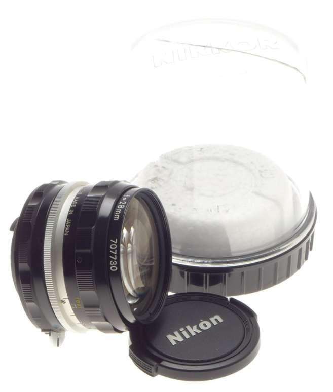 f=28mm NIKKOR-H AUTO 1:3.5 f=2.8cm NIPPON 35mm SLR LENS CAPS KEEPER 3.5/28 BLACK