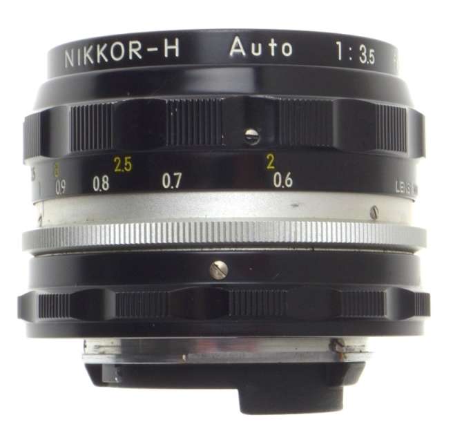 f=28mm NIKKOR-H AUTO 1:3.5 f=2.8cm NIPPON 35mm SLR LENS CAPS KEEPER 3.5/28 BLACK