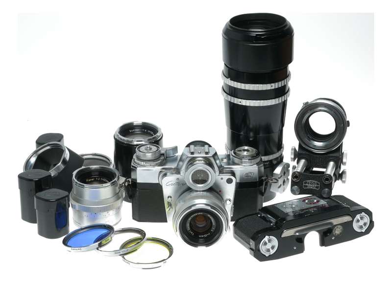 Zeiss Ikon Contarex Bullseye SLR film camera Distagon Sonnar Planar lenses macro bellows in trave...