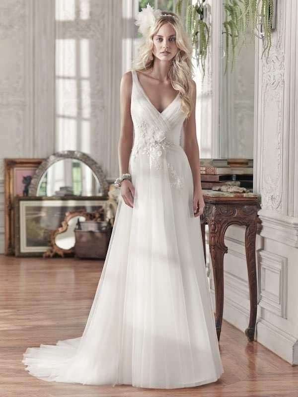 Margrett, Tulle ivory empire wedding dress.