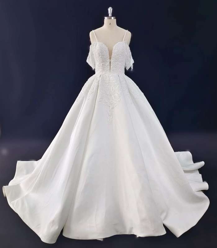 Candice, boob-tube ballgown wedding dress.