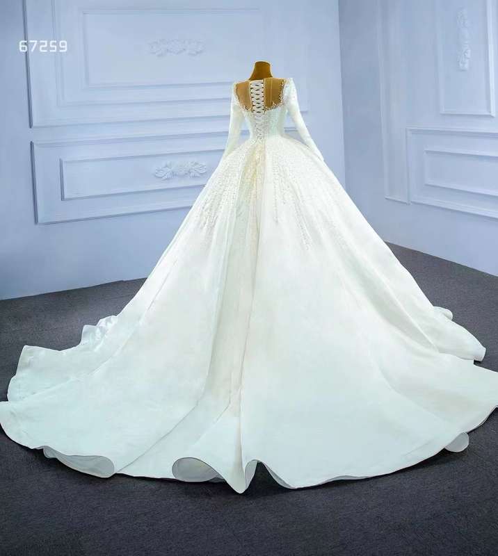 (Rental) Kourtney, long sleeve pearl detail ballgown wedding dress.