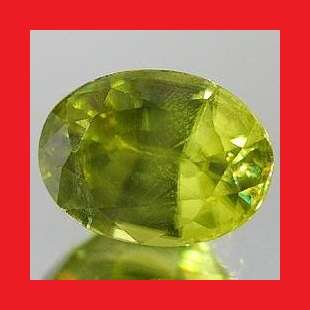 SPHENE - YELLOW GREEN OVAL FACET - 1.72cts