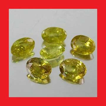SPHENE - LIME YELLOW OVAL FACET - 0.40cts