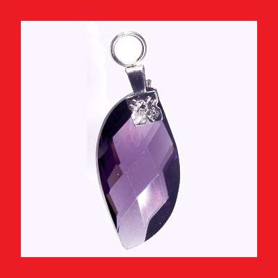 PURPLE CUBIC ZIRCONIUM PENDANT WITH .925 STERLING SILVER BAIL.