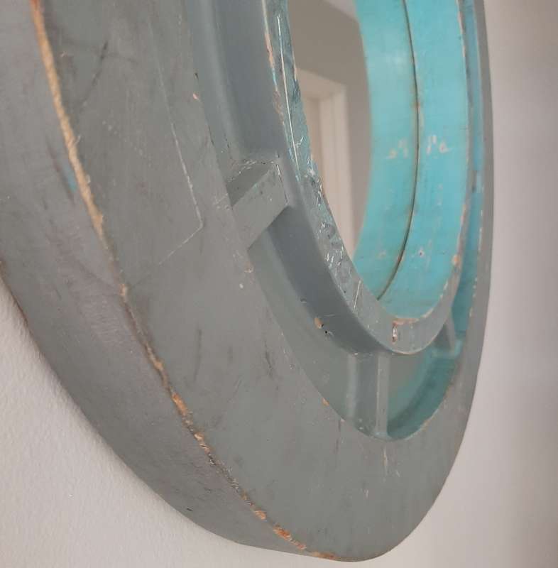 Blue round mirror