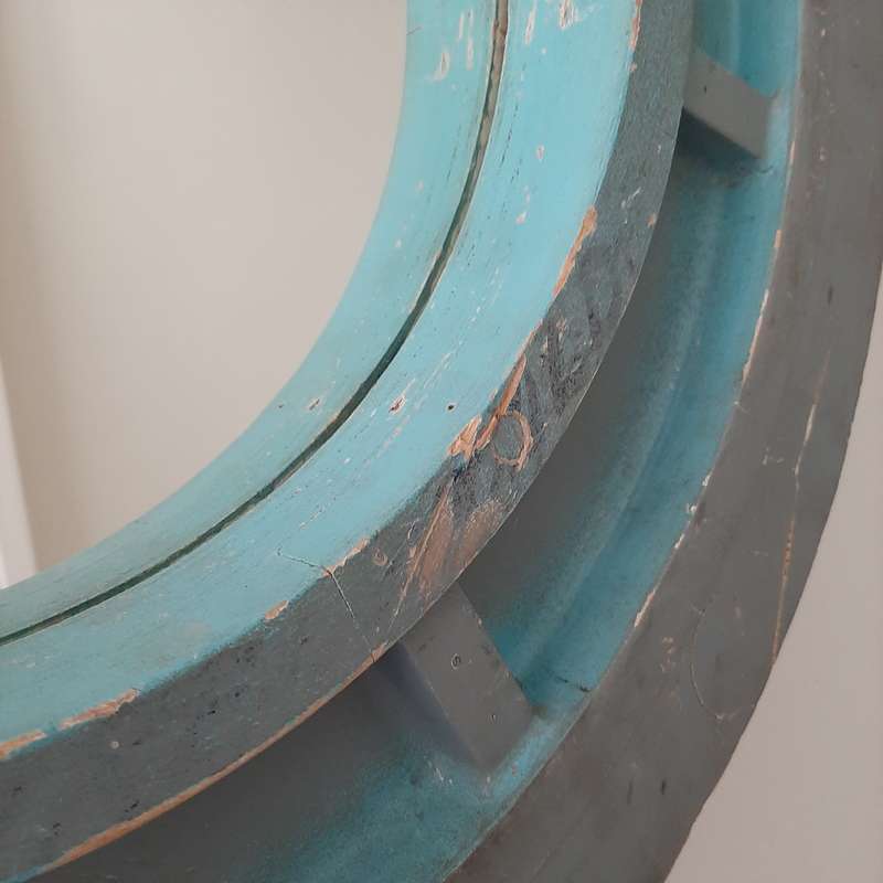 Blue round mirror