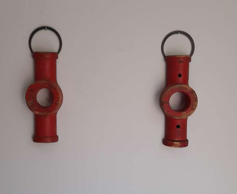 Red hanging toggle shapes