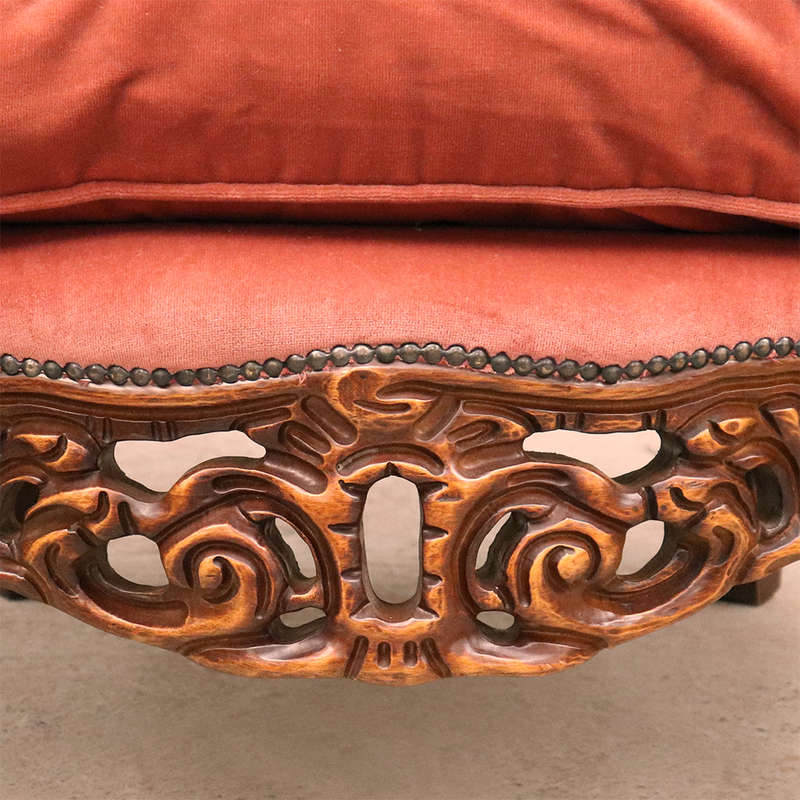 Heavily carved Armchairs