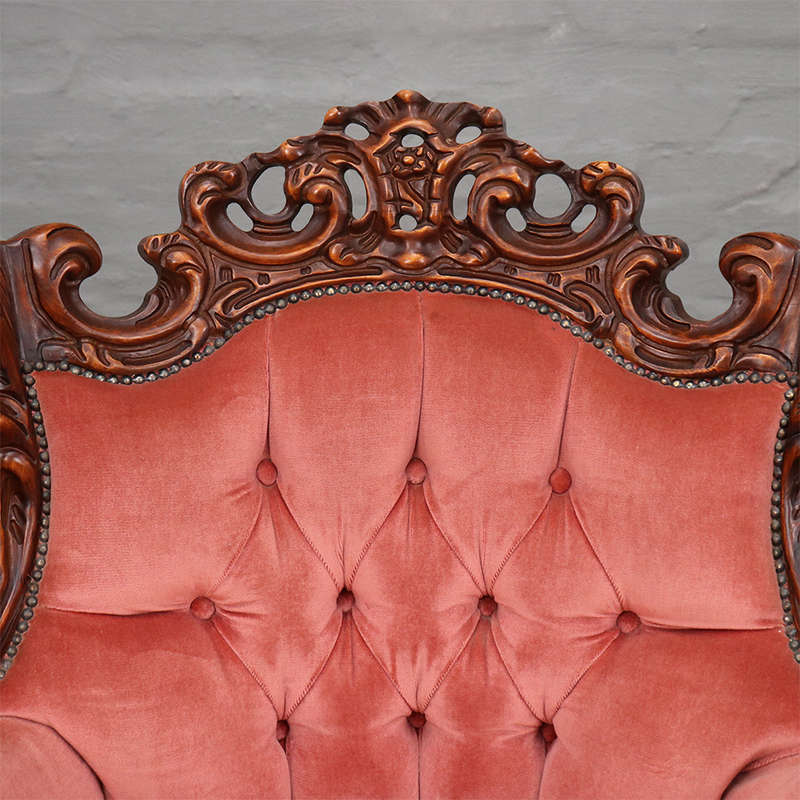 Heavily carved Armchairs